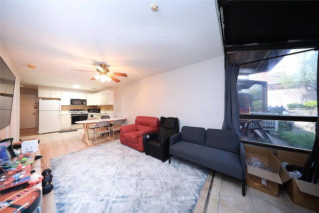 1205 65th St Unit A, Brooklyn, NY 11219 - living room with ceiling fan and light tile patterned floors
