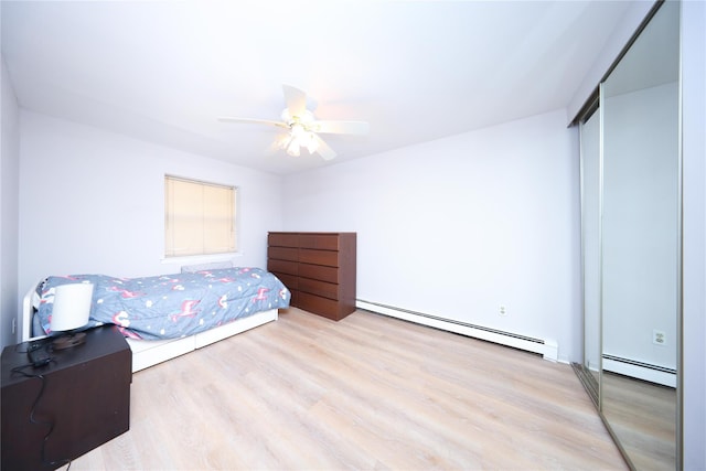 1205 65th St Unit A, Brooklyn, NY 11219 - bedroom with a baseboard radiator, light wood finished floors, and ceiling fan