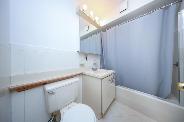 1205 65th St Unit A, Brooklyn, NY 11219 - bathroom with vanity, shower / tub combo with curtain, tile walls, and tile patterned flooring
