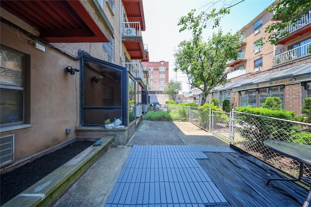 1205 65th St Unit A, Brooklyn, NY 11219 - view of patio / terrace featuring a gate