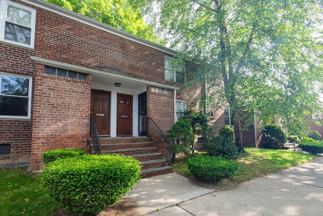 192-1239th Ave 1, Flushing, NY 11358 - view of front of house featuring brick siding and entry steps