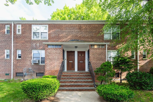 192-1239th Ave 1, Flushing, NY 11358 - townhome / multi-family property featuring brick siding and cooling unit