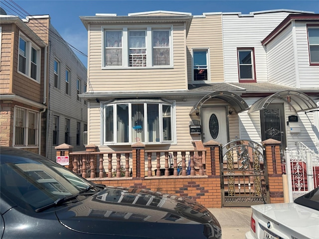 104-16 103rd St, Richmond Hill, NY 11419 - view of front of property featuring a gate