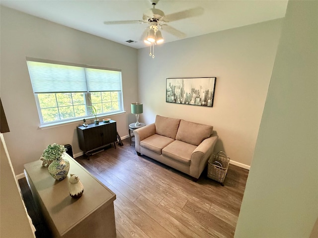 310 Narragansett Villas Dr, Lindenhurst, NY 11757 - living area with hardwood / wood-style flooring and ceiling fan