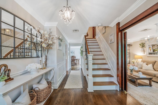 6 Pine St N, Lake Grove, NY 11755 - stairs featuring a chandelier, wood finished floors, ornamental molding, wainscoting, and a decorative wall