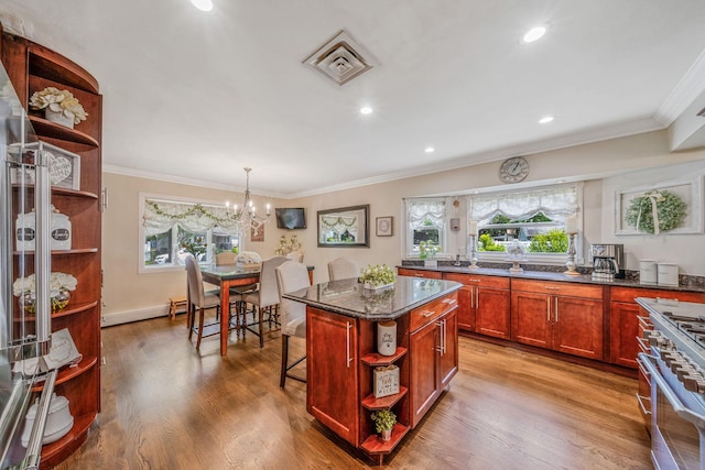 6 Pine St N, Lake Grove, NY 11755 - kitchen featuring open shelves, double oven range, crown molding, light wood finished floors, and a center island