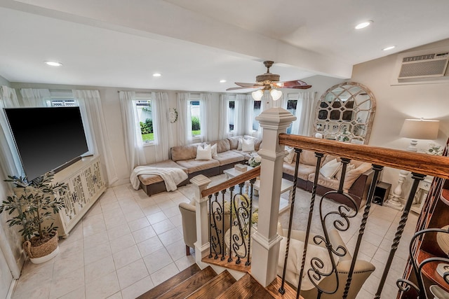 6 Pine St N, Lake Grove, NY 11755 - living area with tile patterned flooring, a wall mounted AC, recessed lighting, and a ceiling fan