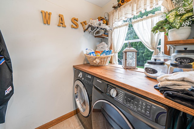6 Pine St N, Lake Grove, NY 11755 - laundry area featuring washing machine and dryer and light tile patterned flooring