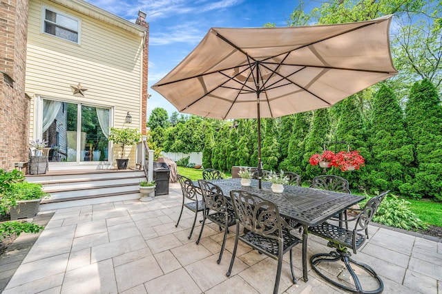 6 Pine St N, Lake Grove, NY 11755 - view of patio / terrace featuring outdoor dining area