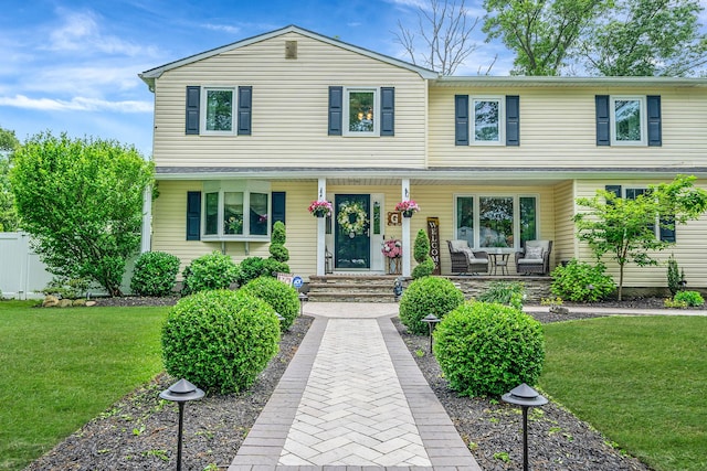 6 Pine St N, Lake Grove, NY 11755 - traditional-style home with covered porch