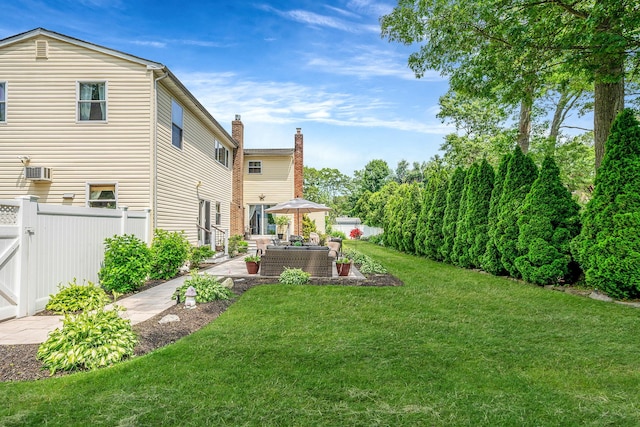 6 Pine St N, Lake Grove, NY 11755 - view of yard featuring a patio, an outdoor living space, and an AC wall unit