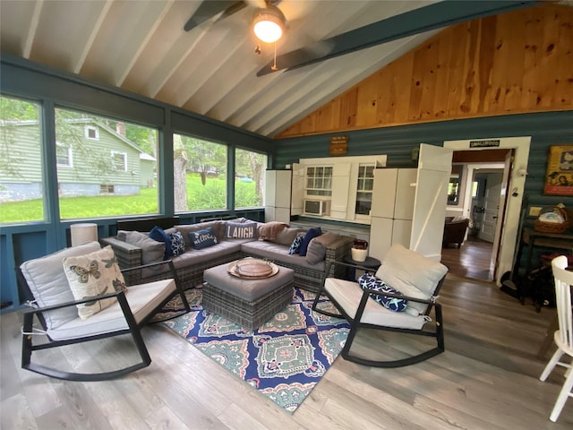 47 E Catskill Trl, Smallwood, NY 12778 - living room featuring a ceiling fan, wood finished floors, beamed ceiling, high vaulted ceiling, and wood walls