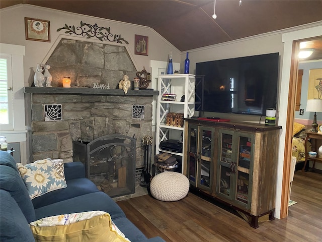 47 E Catskill Trl, Smallwood, NY 12778 - living room featuring wood finished floors, vaulted ceiling, a stone fireplace, and crown molding