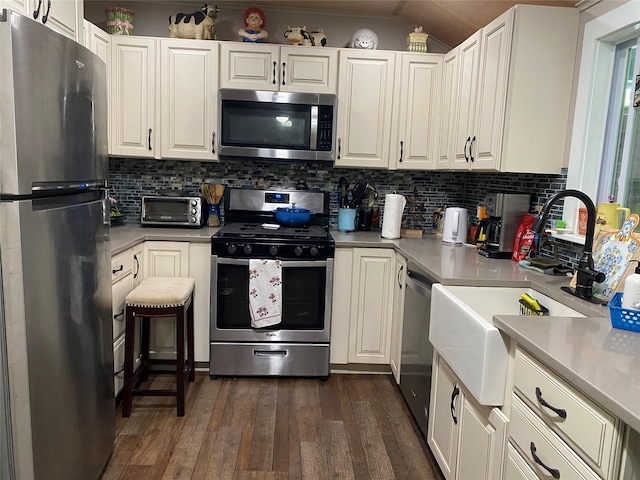 47 E Catskill Trl, Smallwood, NY 12778 - kitchen with stainless steel appliances, dark wood-style flooring, backsplash, white cabinets, and light countertops