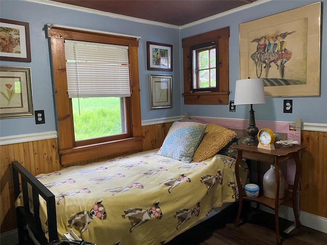 47 E Catskill Trl, Smallwood, NY 12778 - bedroom featuring multiple windows, a wainscoted wall, wooden walls, ornamental molding, and wood finished floors