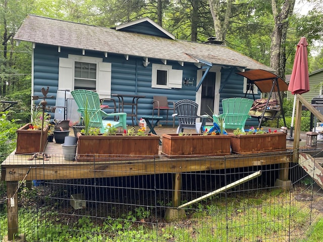 47 E Catskill Trl, Smallwood, NY 12778 - rear view of house with roof with shingles and a deck