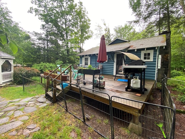 47 E Catskill Trl, Smallwood, NY 12778 - back of house with a deck, a shingled roof, and a chimney