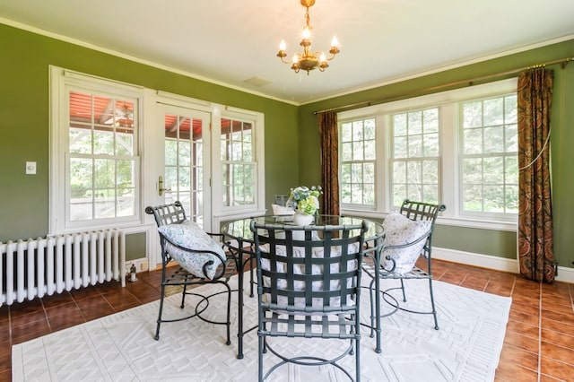 50 Overlook Dr, Chappaqua, NY 10514 - tiled dining space with radiator, a chandelier, plenty of natural light, and ornamental molding