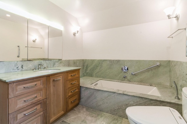 50 Overlook Dr, Chappaqua, NY 10514 - bathroom featuring vanity, a garden tub, and vaulted ceiling