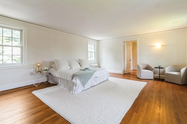 50 Overlook Dr, Chappaqua, NY 10514 - bedroom featuring multiple windows and wood finished floors