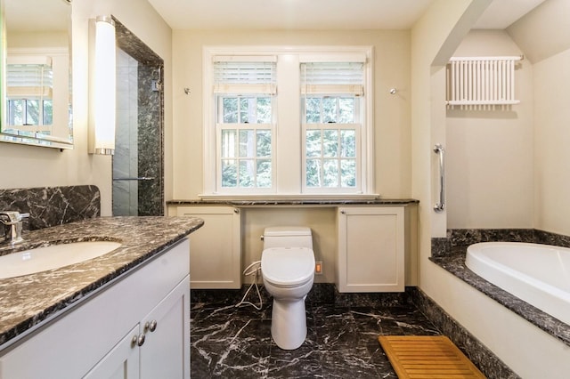50 Overlook Dr, Chappaqua, NY 10514 - full bath with marble tiled floors, vanity, and a garden tub