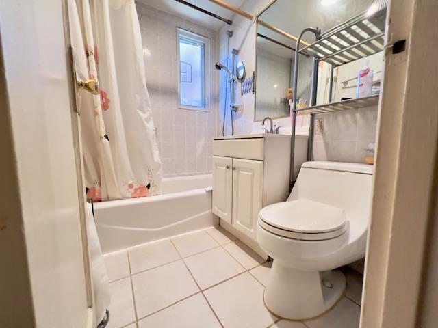 220-34 67th Ave Duplex, Unit Duplex, Bayside, NY 11364 - full bathroom featuring tile patterned flooring, shower / bathtub combination with curtain, and vanity