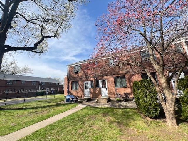 220-34 67th Ave Duplex, Unit Duplex, Bayside, NY 11364 - view of front of house with entry steps and a patio