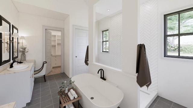 14 Akindale Rd, Pawling, NY 12564 - bathroom with tile patterned floors, a freestanding bath, and vanity