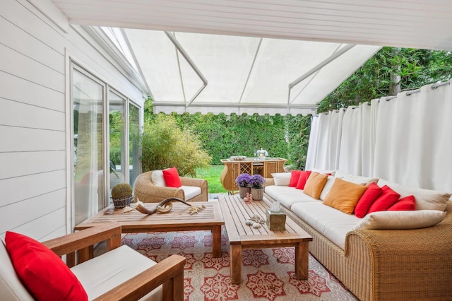 545 Hampton Rd Unit 16, Southampton, NY 11968 - sunroom / solarium with an outdoor hangout area