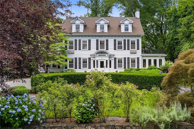 121 Overlook Cir, New Rochelle, NY 10804 - colonial home featuring a chimney