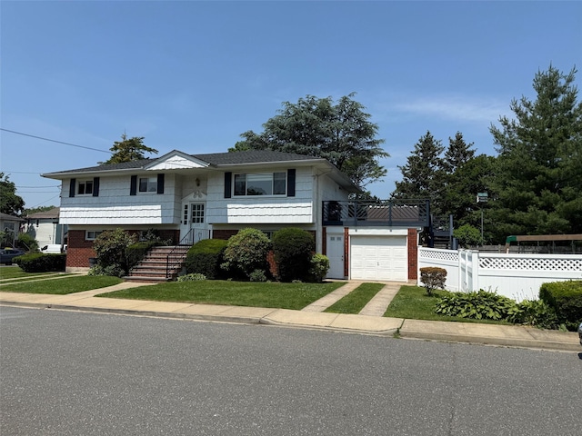 226LAURIELANE Laurie Ln, West Hempstead, NY 11552 - split foyer home featuring driveway and an attached garage