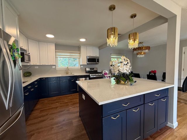 226LAURIELANE Laurie Ln, West Hempstead, NY 11552 - kitchen featuring appliances with stainless steel finishes, blue cabinets, light countertops, white cabinets, and recessed lighting