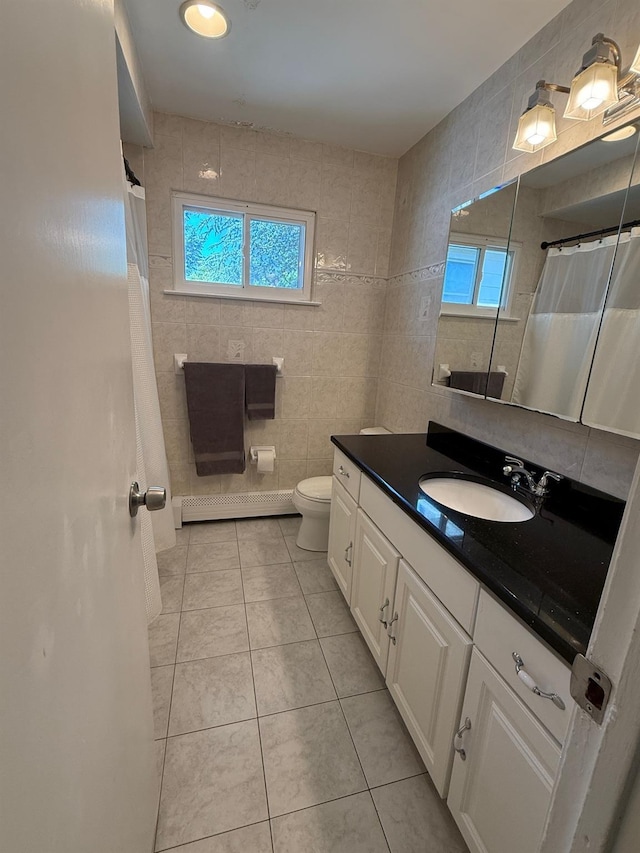 226LAURIELANE Laurie Ln, West Hempstead, NY 11552 - bathroom with tile walls, vanity, tile patterned floors, a shower with shower curtain, and baseboard heating