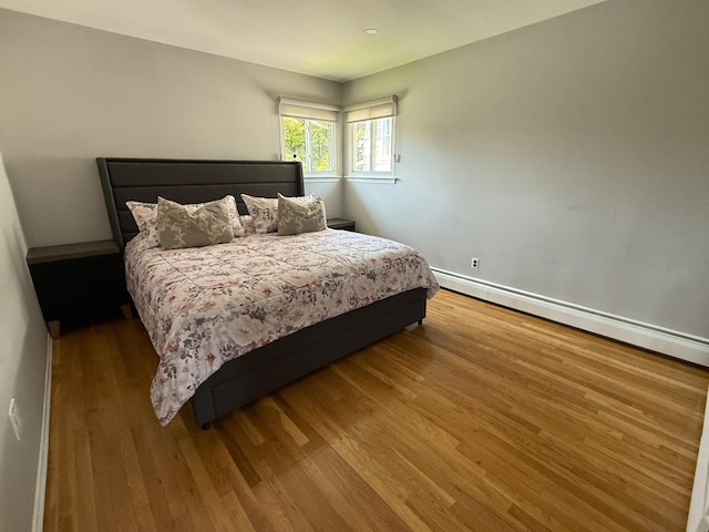 226LAURIELANE Laurie Ln, West Hempstead, NY 11552 - bedroom featuring wood finished floors and baseboard heating