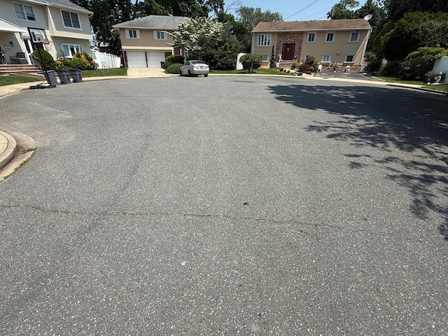 226LAURIELANE Laurie Ln, West Hempstead, NY 11552 - view of asphalt street with curbs and sidewalks