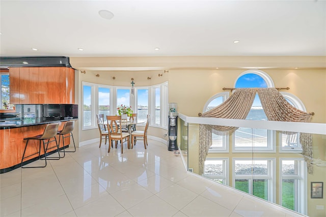 30 Aviva Ct, Staten Island, NY 10307 - dining area with light tile patterned floors, healthy amount of natural light, and recessed lighting