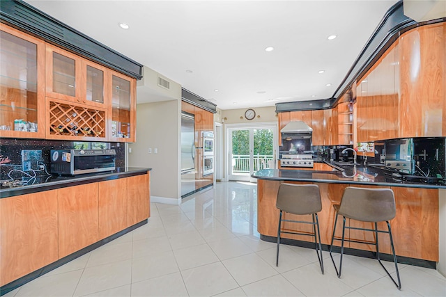 30 Aviva Ct, Staten Island, NY 10307 - kitchen with tasteful backsplash, dark countertops, stove, a peninsula, and recessed lighting