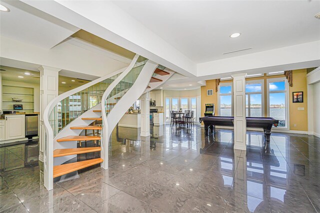 30 Aviva Ct, Staten Island, NY 10307 - staircase with ornate columns, pool table, wine cooler, and recessed lighting