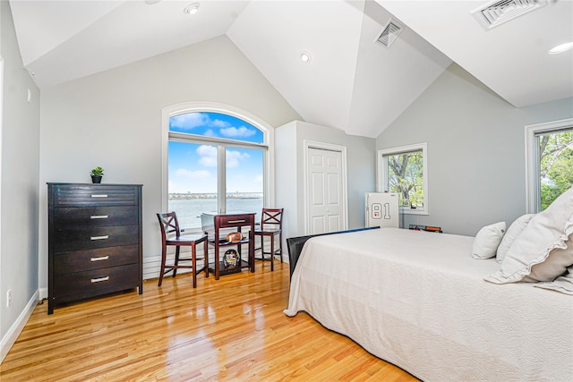 30 Aviva Ct, Staten Island, NY 10307 - bedroom with light wood-style floors, vaulted ceiling, a water view, recessed lighting, and a closet