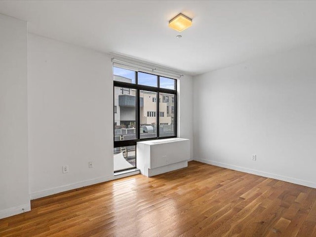 14 Hope St Unit 3F, Brooklyn, NY 11211 - empty room featuring wood finished floors