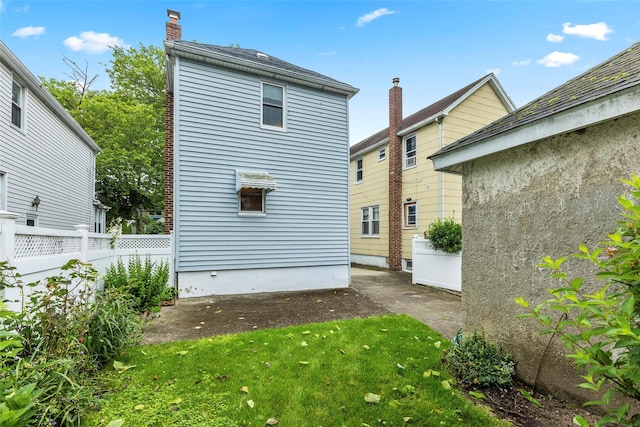 72 Putnam Ave, Valley Stream, NY 11580 - back of property featuring a chimney