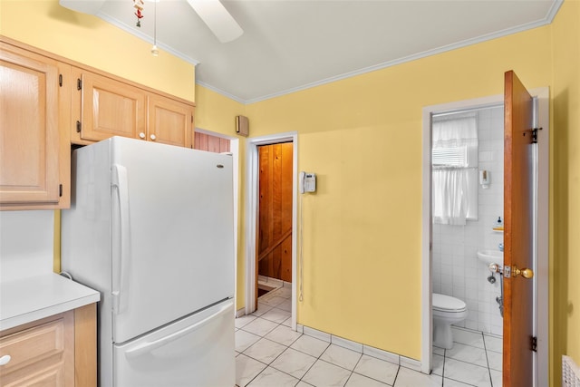 72 Putnam Ave, Valley Stream, NY 11580 - kitchen featuring freestanding refrigerator, ornamental molding, light brown cabinetry, light countertops, and ceiling fan