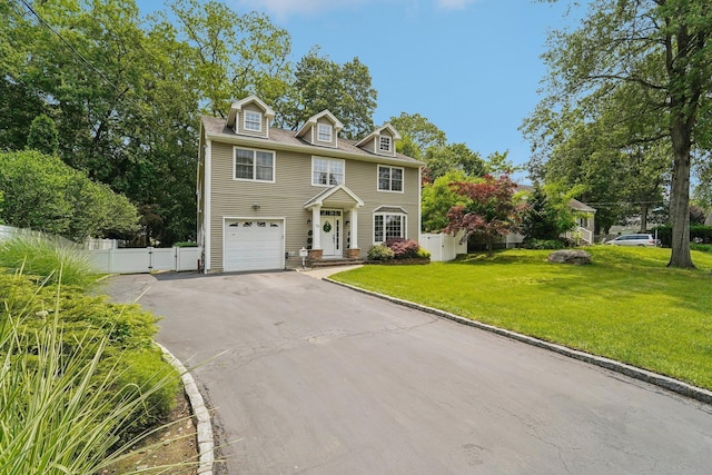 10 Willow Dr, Suffern, NY 10901 - view of front of home featuring asphalt driveway and an attached garage