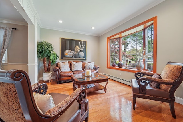 10 Willow Dr, Suffern, NY 10901 - living area featuring a baseboard heating unit, healthy amount of natural light, ornamental molding, light wood-style flooring, and recessed lighting