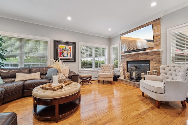 10 Willow Dr, Suffern, NY 10901 - living room with ornamental molding, wood finished floors, a fireplace, and recessed lighting
