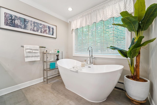 10 Willow Dr, Suffern, NY 10901 - bathroom featuring a soaking tub, ornamental molding, a baseboard heating unit, and recessed lighting