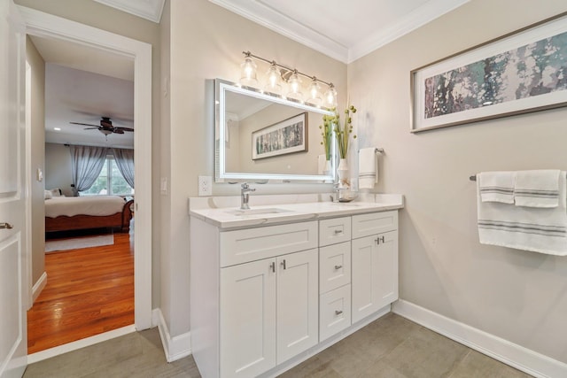 10 Willow Dr, Suffern, NY 10901 - ensuite bathroom featuring double vanity, ornamental molding, and a ceiling fan