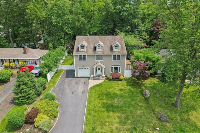 10 Willow Dr, Suffern, NY 10901 - colonial-style house with asphalt driveway and a garage