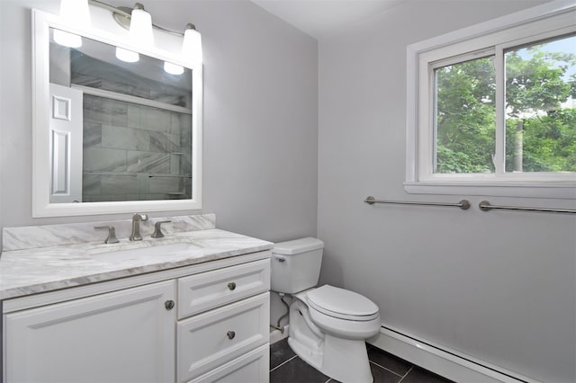 27 Temple Rd, Dobbs Ferry, NY 10522 - full bath with baseboard heating, vanity, tile patterned floors, and tiled shower