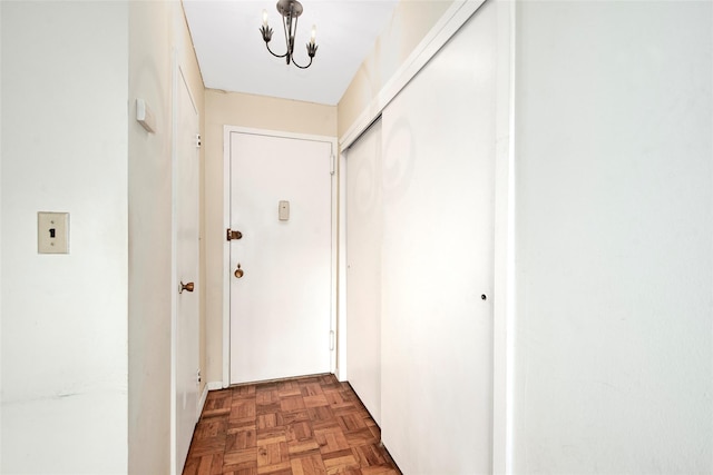 33 Barker Ave Unit 6K, White Plains, NY 10601 - hall featuring a chandelier